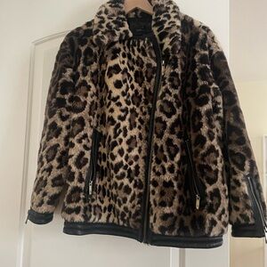 BCBG cheetah print bomber style jacket with pleather trim on cuff. Size M